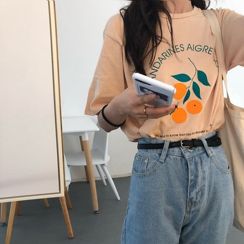 Women Orange Printed Short Sleeve T- Shirts DromedarShop.com Online Boutique