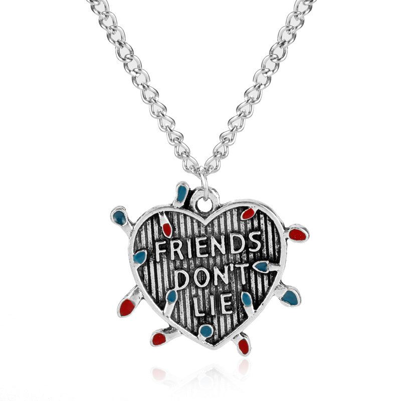 Stranger Things Friends Don't Lie Heart Peach Shaped Pendant - DromedarShop.com Online Boutique